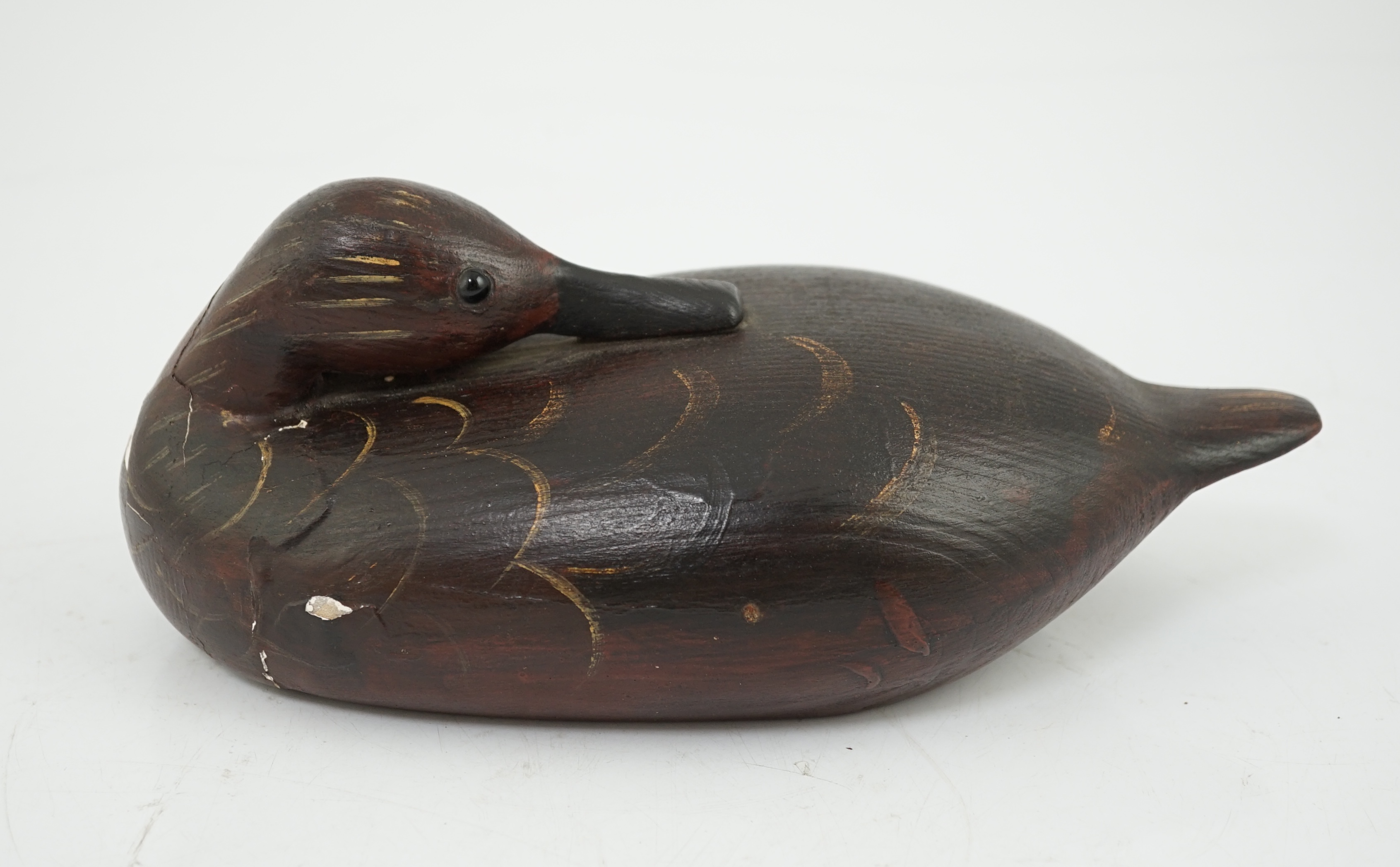 Guy Taplin (British, b.1939), a carved and painted oak model of a duck